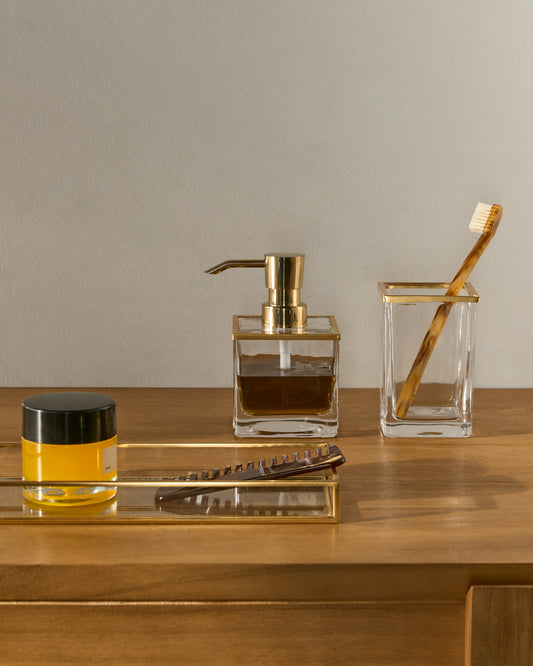 Distributeur de savon Soanet en verre et métal avec finition dorée