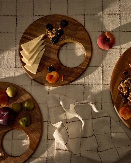 Petite planche de service ronde Klot en bois d’acacia FSC 100%