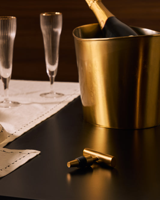 Seau à glace Aruc en acier inoxydable doré.