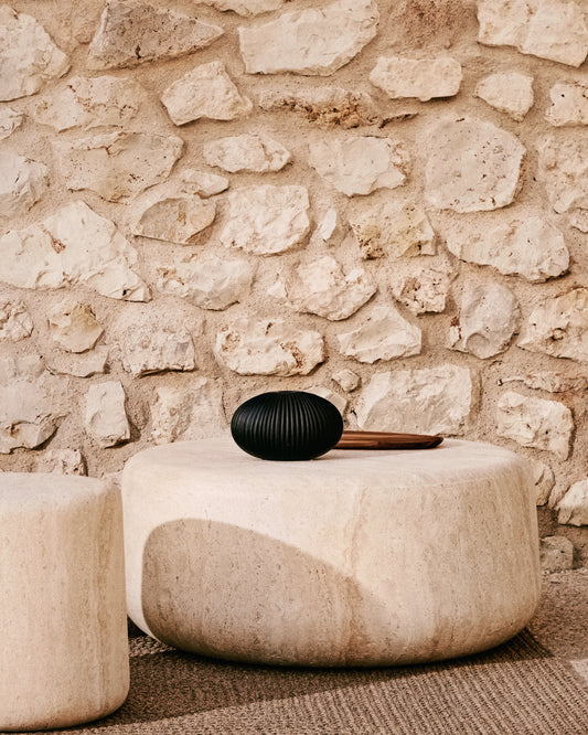 Table basse Drasi en ciment avec finition effet travertin Ø 90 cm