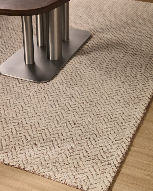 Tapis Calira en laine jacquard à motif tressé beige 230 x 160 cm