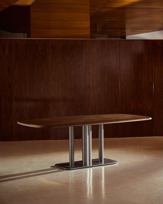 Table Melvar en placage de noyer et pieds avec base en acier inoxydable brossé 180 x 100 cm