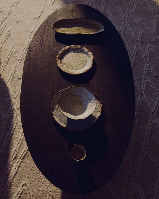 Table basse Ovak en bois d’acacia avec finition noire FSC 100 % 140 x 70 cm