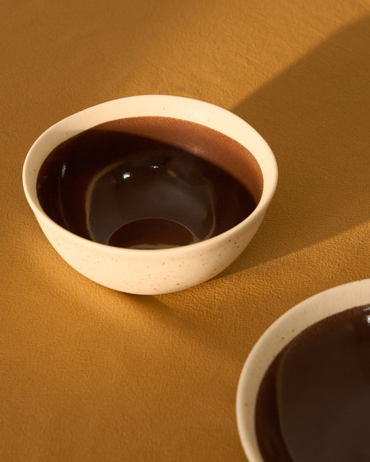 Nale beige ceramic bowl with brown bottom