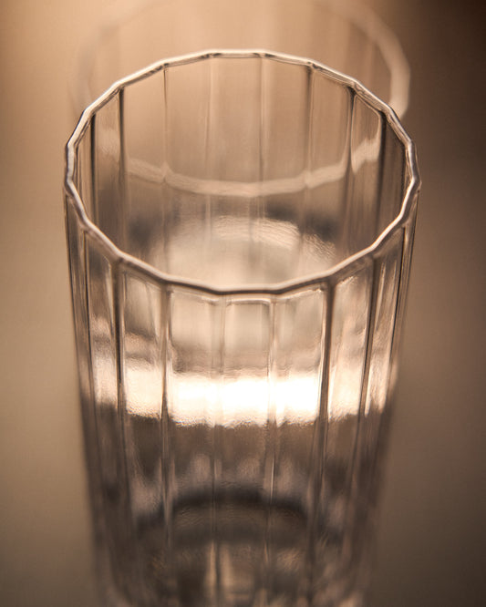 Nivor clear drinking glass with carved vertical relief, 30 cl