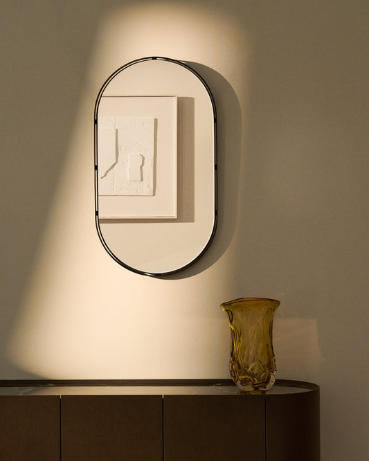 Miroir ovale Noral en métal noir 50,5 x 90 cm