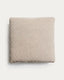 Coussin Blok en chenille beige 60 x 60 cm