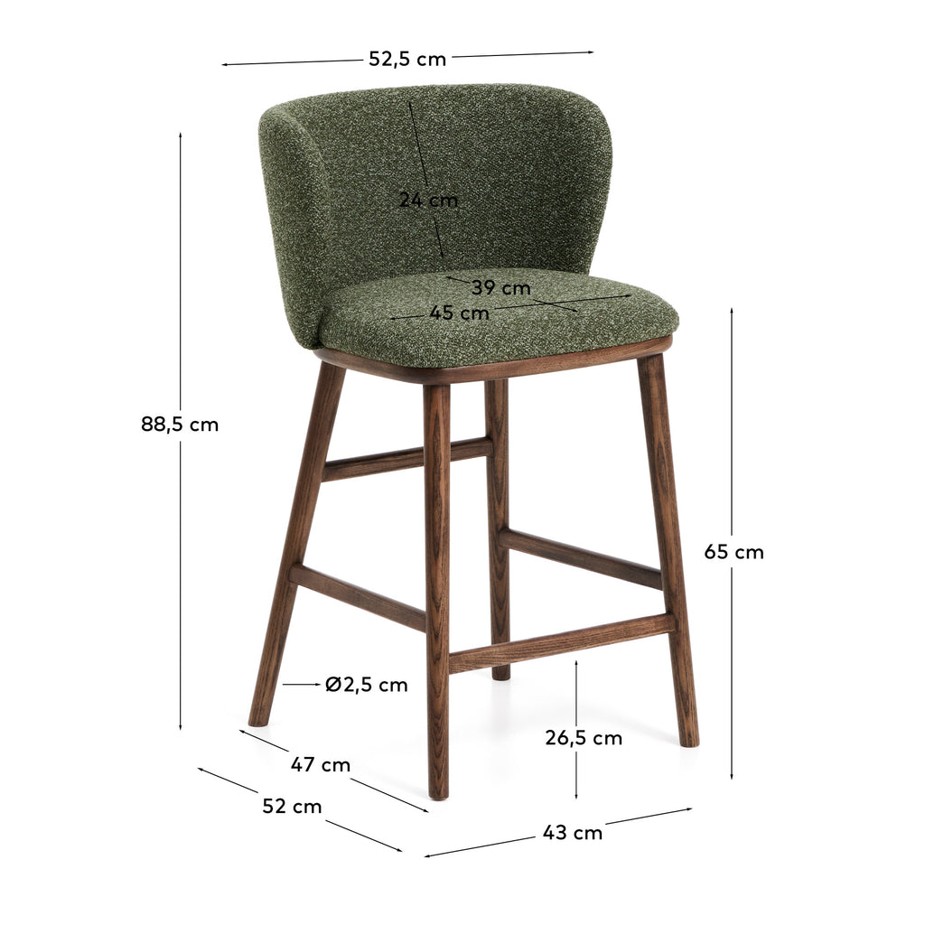 Tabouret Ciselia en chenille épaisse vert foncé et pieds en bois de frêne avec finition ton noyer FSC Mix Credit 65 cm