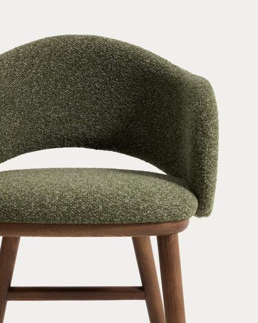 Maina stool in thick green chenille with solid ash wood legs and a walnut-tone finish, FSC Mix Credit 65 cm