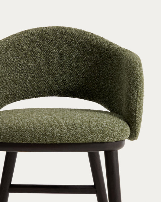 Maina stool in thick green chenille with solid ash wood legs and a ebonised finish, FSC Mix Credit 65 cm