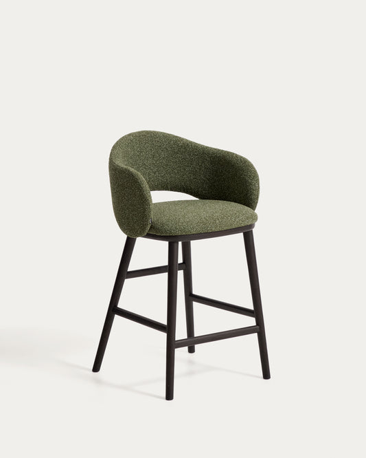 Maina stool in thick green chenille with solid ash wood legs and a ebonised finish, FSC Mix Credit 65 cm