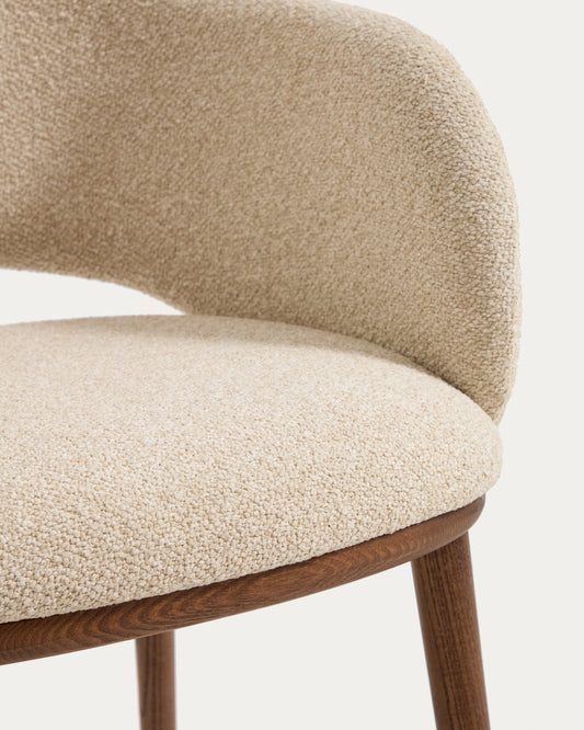 Maina chair in thick beige chenille with solid ash wood legs and a walnut-tone finish, FSC Mix Credit