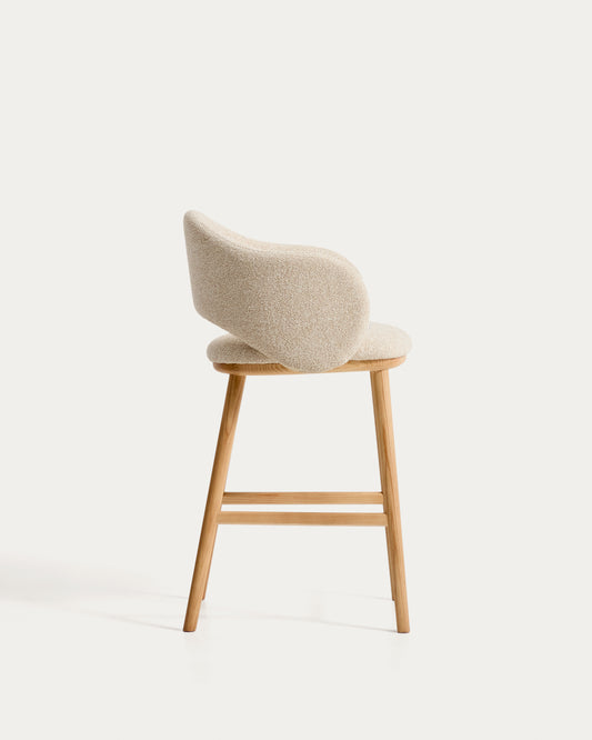 Maina stool in thick beige chenille with solid ash wood legs and a natural-tone finish, FSC Mix Credit 65 cm