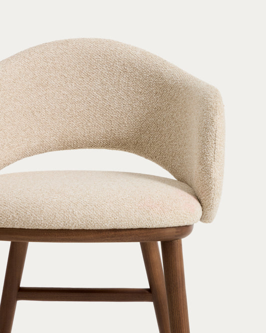 Maina stool in thick beige chenille with solid ash wood legs and a walnut-tone finish, FSC Mix Credit 65 cm