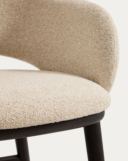 Maina stool in thick beige chenille with solid ash wood legs and a ebonised finish, FSC Mix Credit 65 cm