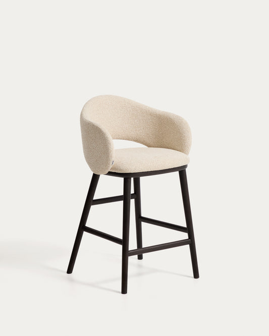 Maina stool in thick beige chenille with solid ash wood legs and a ebonised finish, FSC Mix Credit 65 cm