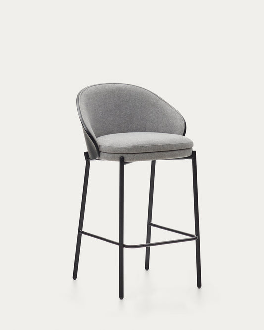 Tabouret Eamy en tissu chenille gris clair placage de frêne finition noire et métal noir hauteur 65 cm