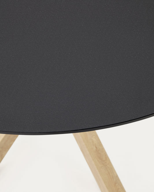 Table ronde Argo en verre noir mat et pieds en acier effet bois Ø 150 cm