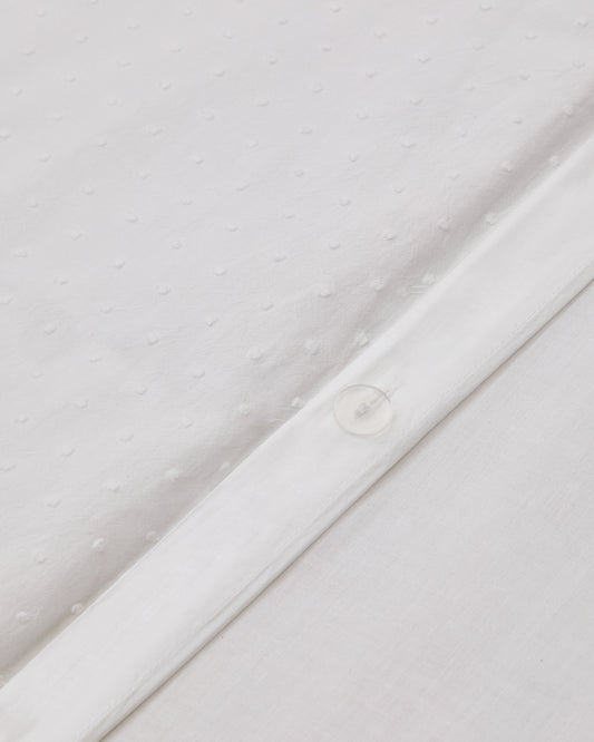 Ensemble Atenie housse de couette taie d’oreiller coton blanc détail plumetis lit de 90 cm