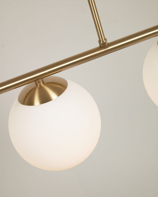 Suspension Mahala avec détail en acier finition laiton avec 3 boules en verre émaillé